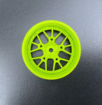 Close-up of Tetsujin Super Rim 'Lycoris' RC Wheels with adjustable offset features flu green