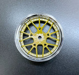 Close-up of Tetsujin Super Rim 'Lycoris' RC Wheels with adjustable offset features gold