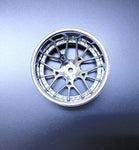 Close-up of Tetsujin Super Rim 'Lycoris' RC Wheels with adjustable offset features chrome