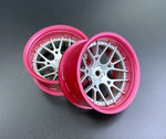 Close-up of Tetsujin Super Rim 'Lycoris' RC Wheels with adjustable offset features pink and silver