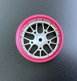 Close-up of Tetsujin Super Rim 'Lycoris' RC Wheels with adjustable offset features pink